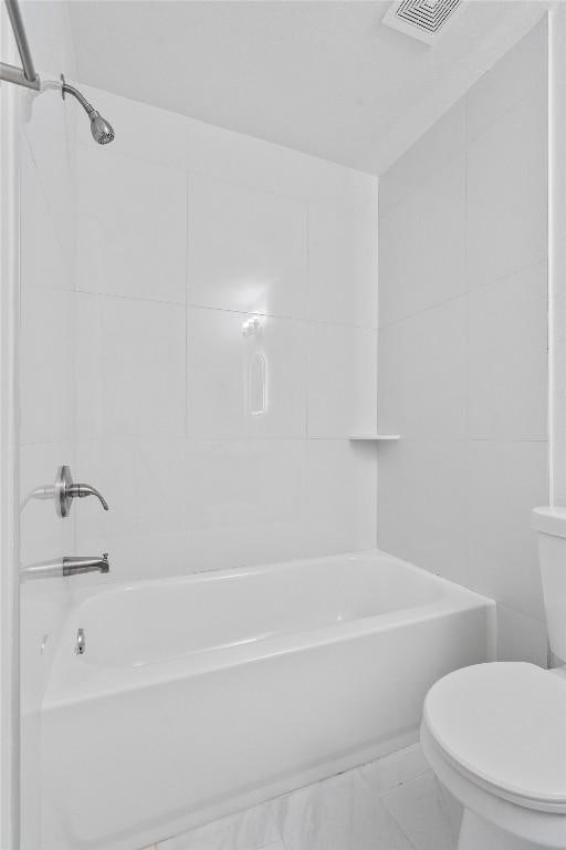 8121 Almondsbury Ln, Austin, TX 78748 - full bath with toilet, bathtub / shower combination, and marble look tile flooring