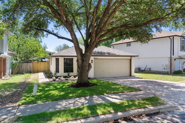8121 Almondsbury Ln, Austin, TX 78748 - view of front facade with a garage and concrete driveway