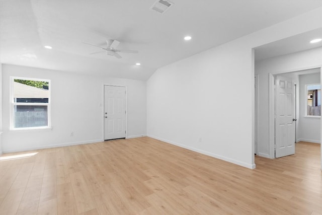 8121 Almondsbury Ln, Austin, TX 78748 - spare room with a ceiling fan, light wood-style flooring, baseboards, recessed lighting, and vaulted ceiling