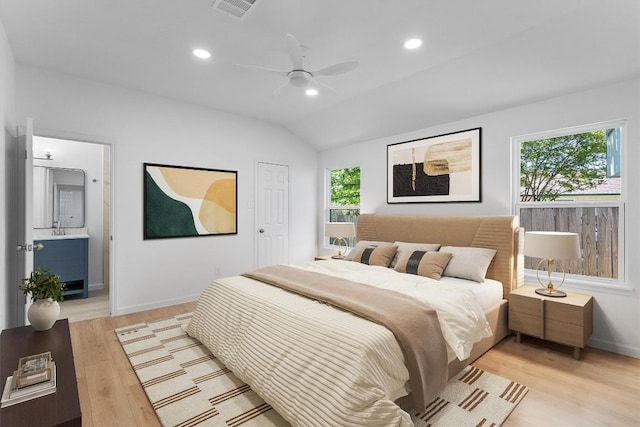 8121 Almondsbury Ln, Austin, TX 78748 - bedroom featuring light wood-style floors, baseboards, recessed lighting, vaulted ceiling, and ceiling fan