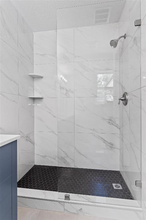 8121 Almondsbury Ln, Austin, TX 78748 - bathroom with a marble finish shower and vanity