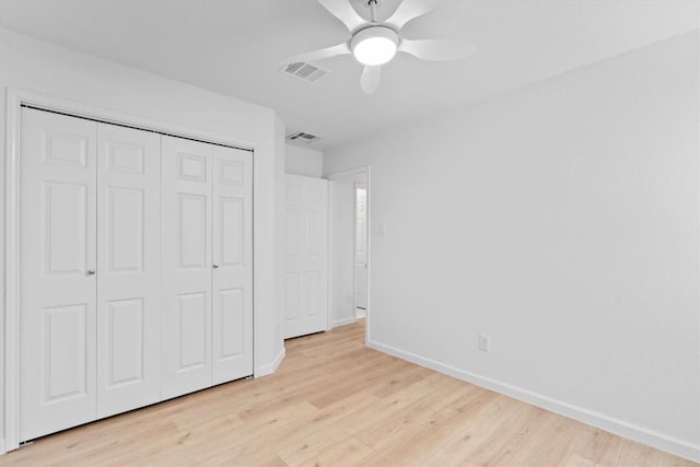 8121 Almondsbury Ln, Austin, TX 78748 - unfurnished bedroom featuring baseboards, light wood-type flooring, a closet, and a ceiling fan