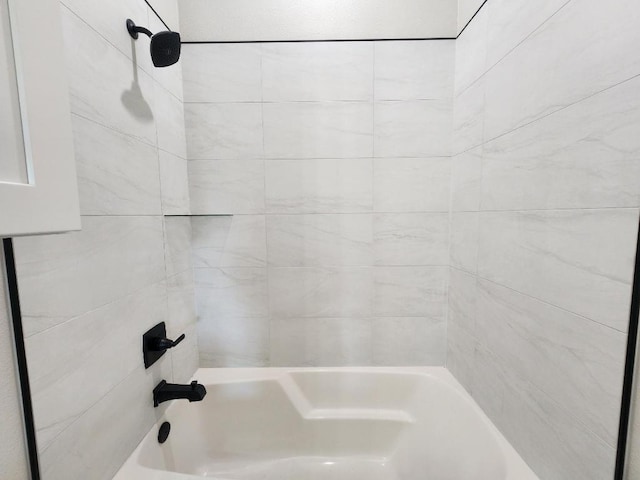 bathroom with shower / washtub combination