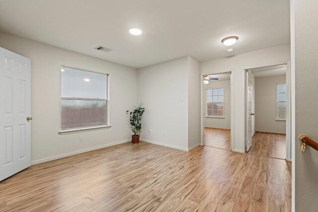400 W Tudor House Rd, Pflugerville, TX 78660 - unfurnished room with light wood-style floors and a ceiling fan