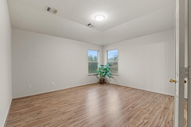 400 W Tudor House Rd, Pflugerville, TX 78660 - empty room featuring light wood finished floors