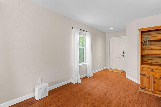 4302 Kings Canyon Dr, Taylor, TX 76574 - unfurnished room featuring recessed lighting, light wood-type flooring, and baseboards