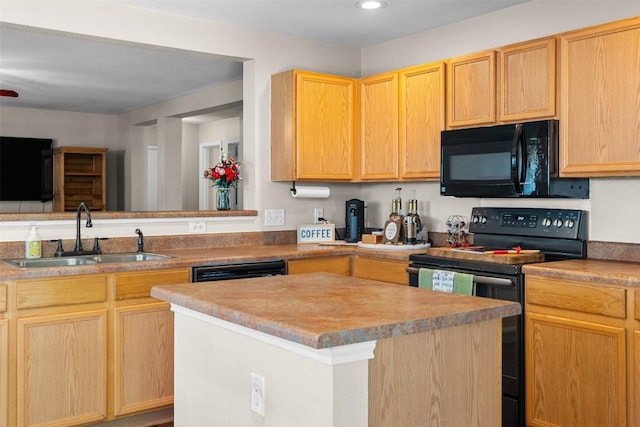 4302 Kings Canyon Dr, Taylor, TX 76574 - kitchen featuring light brown cabinets, black appliances, a center island, and a sink