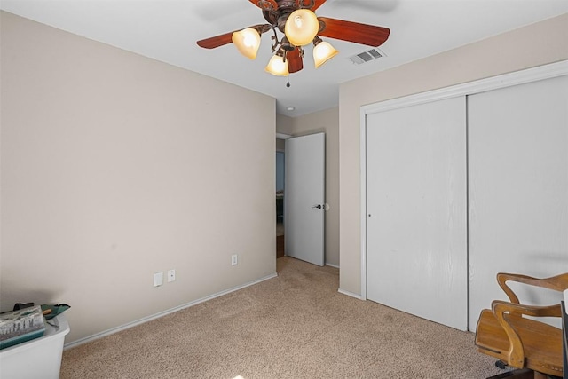 4302 Kings Canyon Dr, Taylor, TX 76574 - unfurnished bedroom with a closet, ceiling fan, carpet floors, baseboards, and visible vents