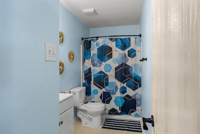 4302 Kings Canyon Dr, Taylor, TX 76574 - full bath with visible vents, vanity, curtained shower, and toilet