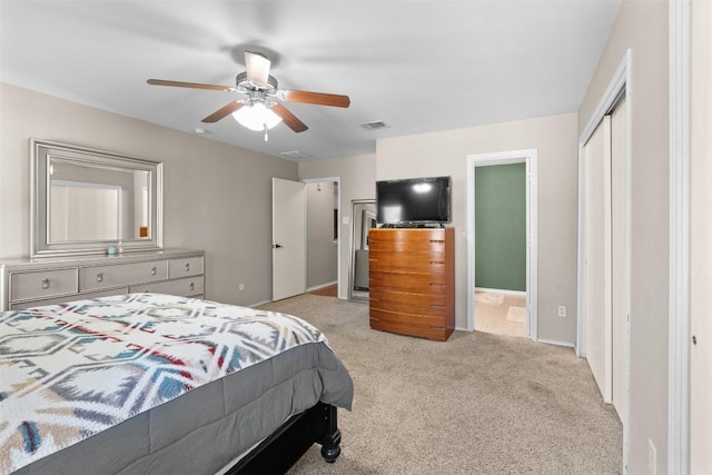 4302 Kings Canyon Dr, Taylor, TX 76574 - carpeted bedroom with a ceiling fan, connected bathroom, and a closet