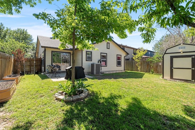 4302 Kings Canyon Dr, Taylor, TX 76574 - back of house featuring a fenced backyard, a yard, a patio, and a storage shed