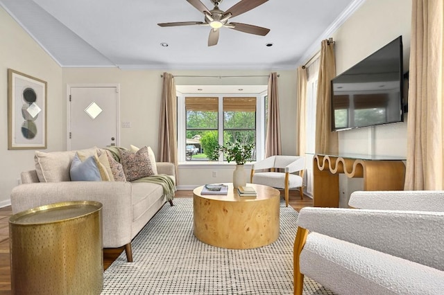 7313 Grover Ave, Austin, TX 78757 - living room with wood finished floors, a ceiling fan, and ornamental molding