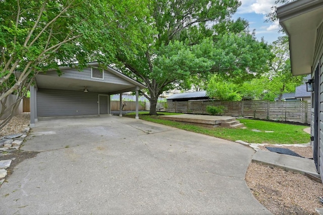 7313 Grover Ave, Austin, TX 78757 - fenced backyard with concrete driveway
