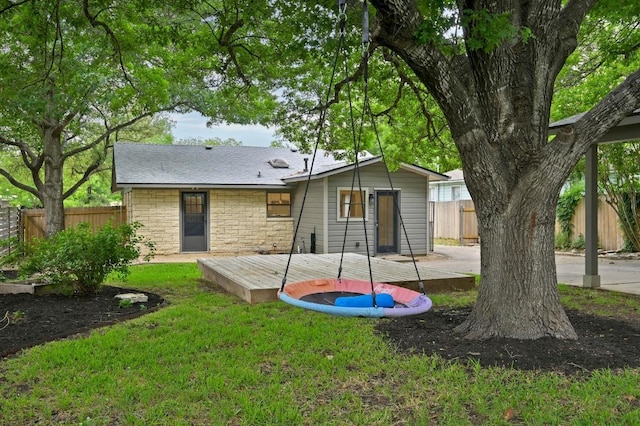 7313 Grover Ave, Austin, TX 78757 - rear view of house featuring a deck and stone siding