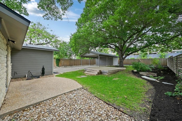 7313 Grover Ave, Austin, TX 78757 - fenced backyard with a patio