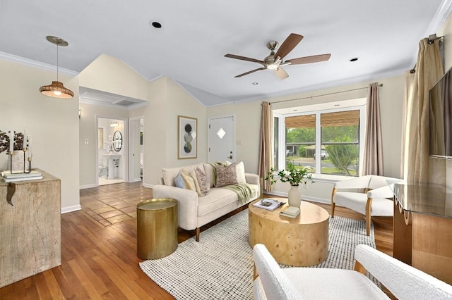 7313 Grover Ave, Austin, TX 78757 - living room featuring ornamental molding, a ceiling fan, wood finished floors, and lofted ceiling
