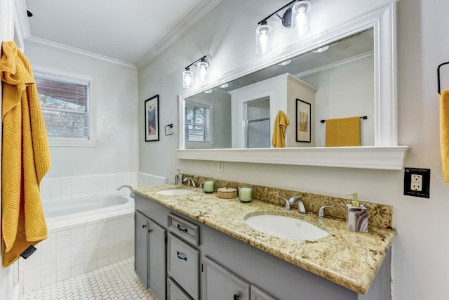 1606 W 14th St, Austin, TX 78703 - bathroom featuring double vanity, a bath, tile patterned floors, plenty of natural light, and crown molding