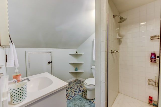 1606 W 14th St, Austin, TX 78703 - full bath with toilet, a shower stall, vanity, vaulted ceiling, and tile patterned floors