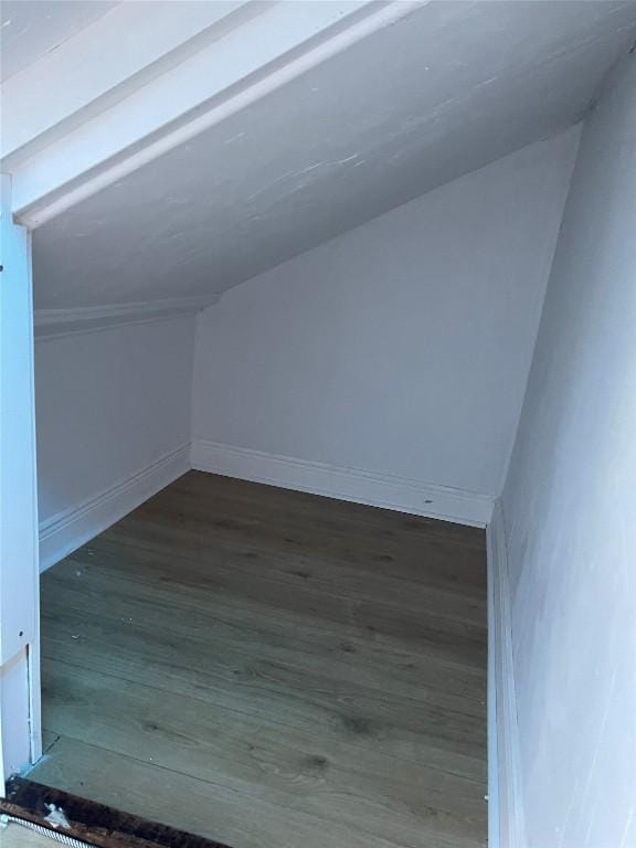 1606 W 14th St, Austin, TX 78703 - additional living space featuring wood finished floors, lofted ceiling, and baseboards