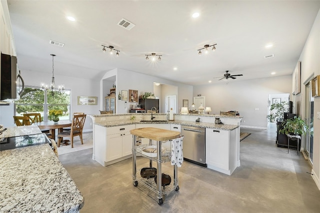 19908 Victoria Chase Rd, Lago Vista, TX 78645 - kitchen featuring appliances with stainless steel finishes, finished concrete flooring, open floor plan, ceiling fan, and recessed lighting
