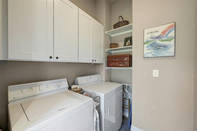 19908 Victoria Chase Rd, Lago Vista, TX 78645 - laundry area featuring cabinet space and washer and dryer