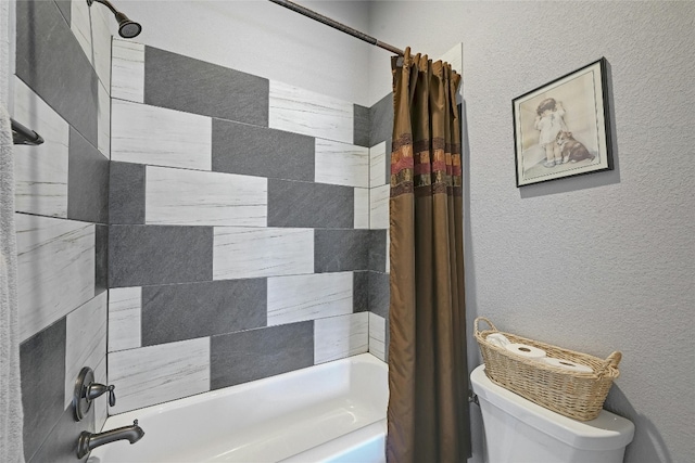 19908 Victoria Chase Rd, Lago Vista, TX 78645 - bathroom featuring shower / bath combo with shower curtain and a textured wall