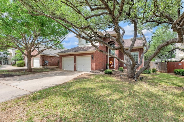 10020 Lachlan Dr, Austin, TX 78717 - traditional home with brick siding, fence, driveway, and a front yard