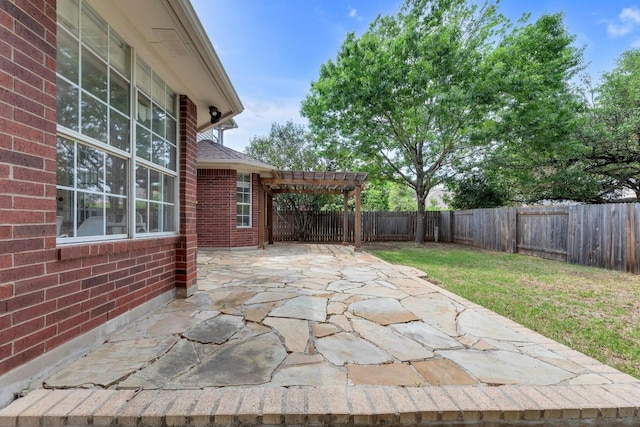 10020 Lachlan Dr, Austin, TX 78717 - view of patio featuring a pergola, a fenced backyard, and an attached carport
