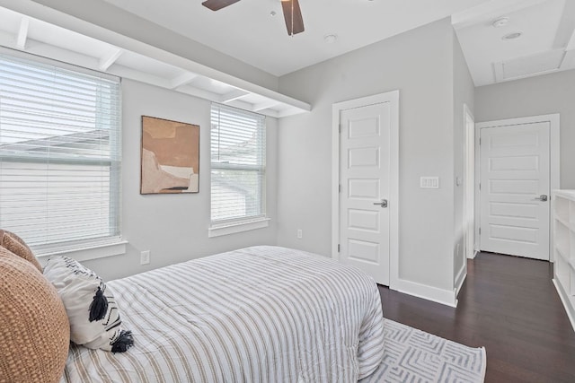 bedroom featuring dark wood-style floors, baseboards, and ceiling fan