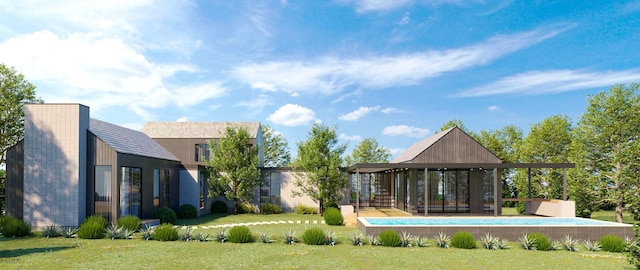 rear view of property featuring a yard and an outdoor pool