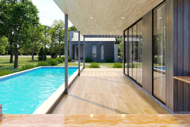 outdoor pool with a patio area