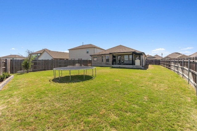 205 Bright Star Ln, Georgetown, TX 78628 - view of yard featuring a trampoline