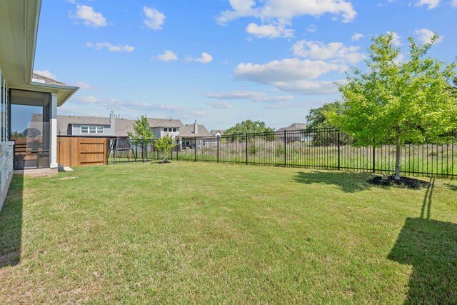 view of yard featuring a fenced backyard