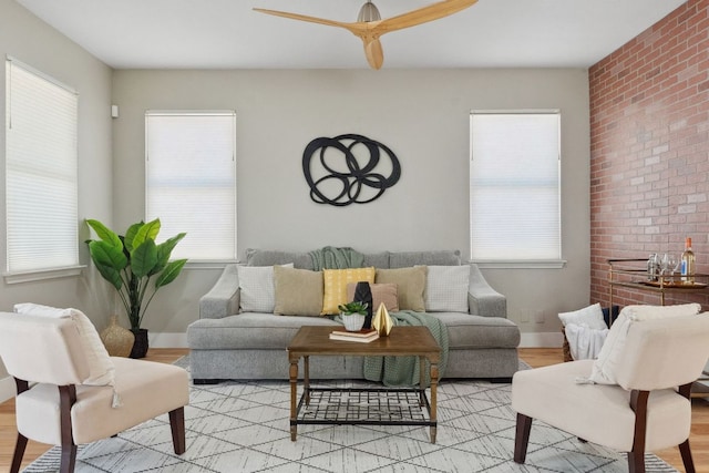 7617 Carver Ave Unit 1, Austin, TX 78752 - living room with plenty of natural light, a ceiling fan, and light wood-style floors