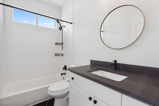 7617 Carver Ave Unit 1, Austin, TX 78752 - full bath with vanity, toilet, bathtub / shower combination, and tile patterned flooring