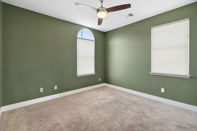 7617 Carver Ave Unit 1, Austin, TX 78752 - carpeted empty room featuring a ceiling fan and baseboards