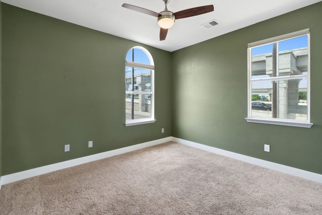 7617 Carver Ave Unit 1, Austin, TX 78752 - empty room with a ceiling fan, carpet flooring, and baseboards
