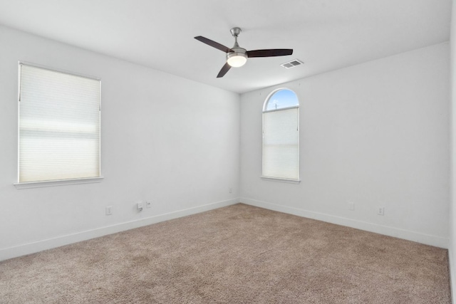 7617 Carver Ave Unit 1, Austin, TX 78752 - spare room featuring carpet flooring, ceiling fan, and baseboards
