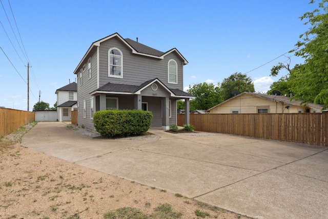 7617 Carver Ave Unit 1, Austin, TX 78752 - traditional-style home with a shingled roof and covered porch