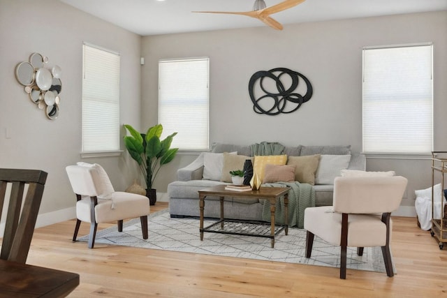 7617 Carver Ave Unit 1, Austin, TX 78752 - living area featuring plenty of natural light, light wood-style flooring, and a ceiling fan