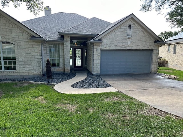 ranch-style home featuring an attached garage, driveway, stone siding, and a shingled roof