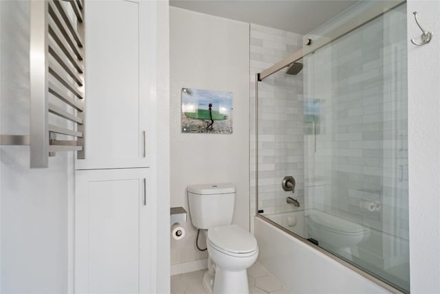 full bathroom featuring radiator, tile patterned flooring, shower / bath combination with glass door, and toilet