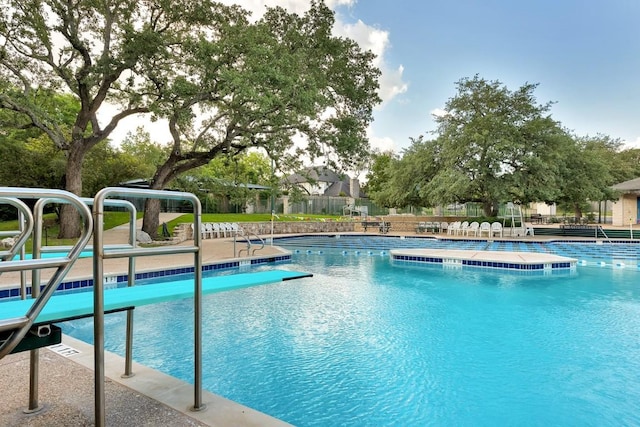 community pool with fence