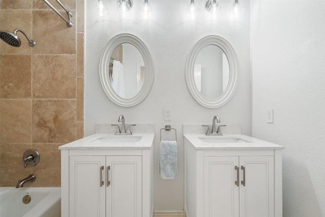 4014 Walnut Clay Dr, Austin, TX 78731 - full bath with two vanities and shower / washtub combination