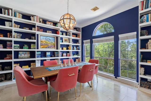 4014 Walnut Clay Dr, Austin, TX 78731 - tiled dining room with a chandelier and built in features