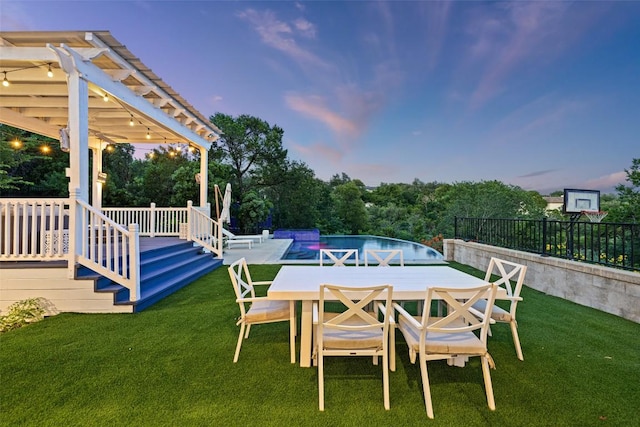4014 Walnut Clay Dr, Austin, TX 78731 - yard at dusk with a lawn and outdoor dining space