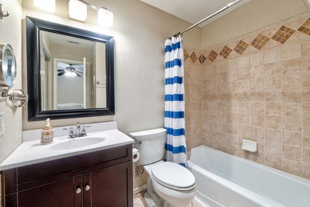 bathroom with shower / bath combo, a ceiling fan, vanity, a textured wall, and toilet