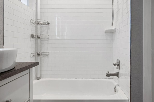 full bath with washtub / shower combination and vanity
