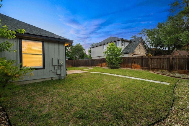 view of yard featuring a fenced backyard