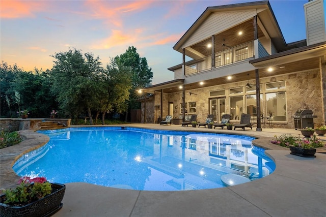 16016 Palomino Ranch Dr, Leander, TX 78641 - swimming pool featuring ceiling fan, a grill, and a patio